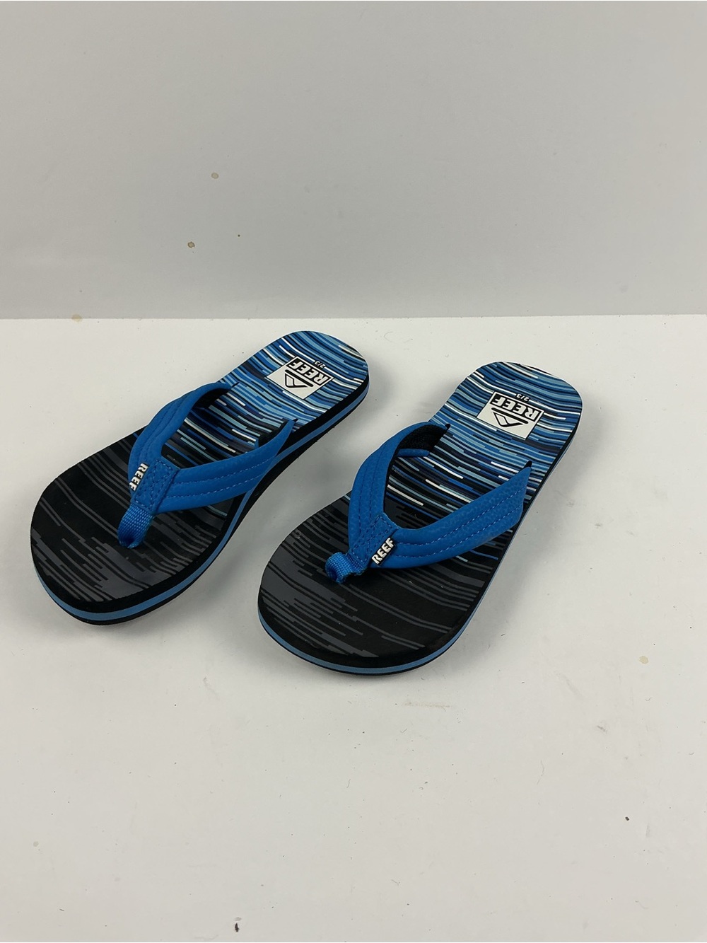 Reef kids Black and Blue Striped Flip Flops